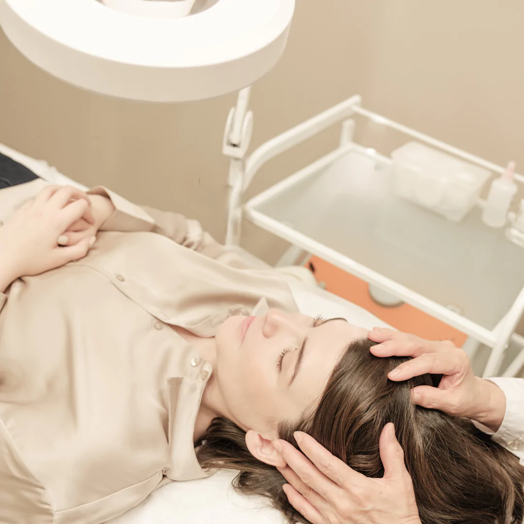 A client being prepared for treatment at Femme Laser Clinic